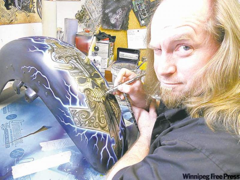 A local airbrush artist is heading to the Minneapolis Motorcycle Show this