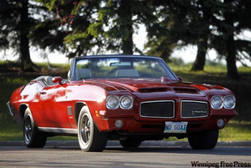 Andre Lemoine's 1971 LeMans Sport convertable WHILE the Pontiac GTO and