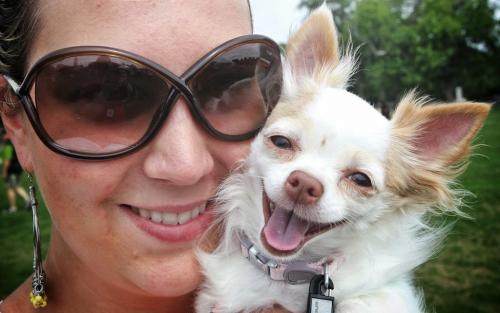 All smiles, Olivia Danylchuk and Winnie along with hundreds of dogs and their owners walked - 16734781
