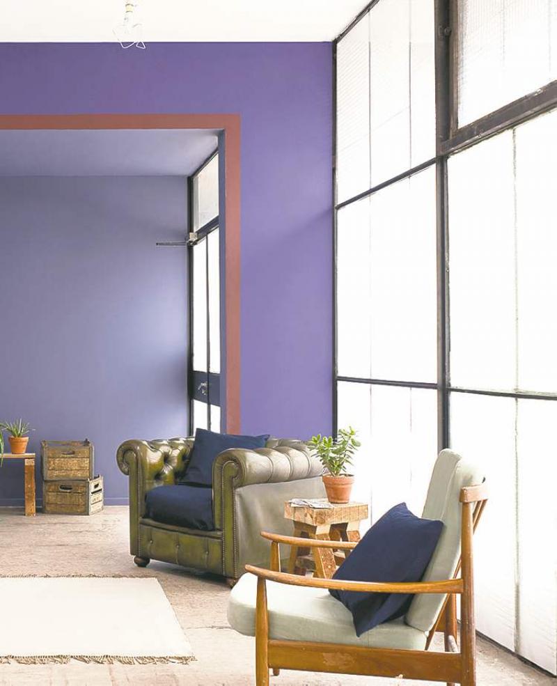 A room enveloped in deep blue is brought to life by the colour's soothing and elegant feel.