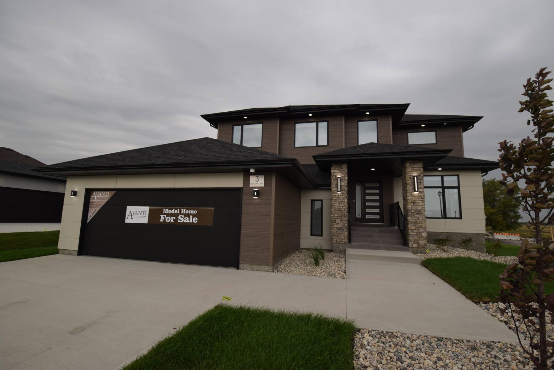  <p>Todd Lewys / Free Press</p>
                                <p>The 2,463 sq. ft., two-storey home possesses plenty of wow factor both outside and inside.</p> 