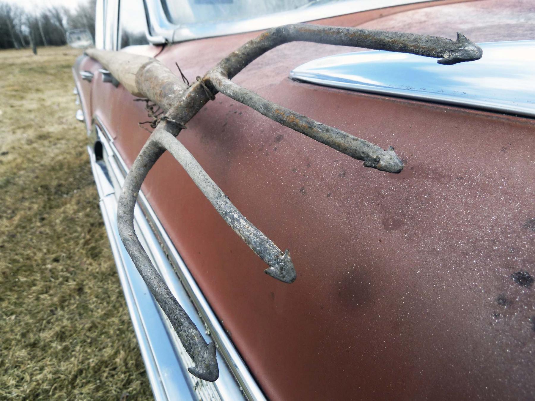 <p>Photos by Laurie Mustard / Winnipeg Free Press</p><p>This three metre long fork should help Mustard keep a fair distance from others. </p>