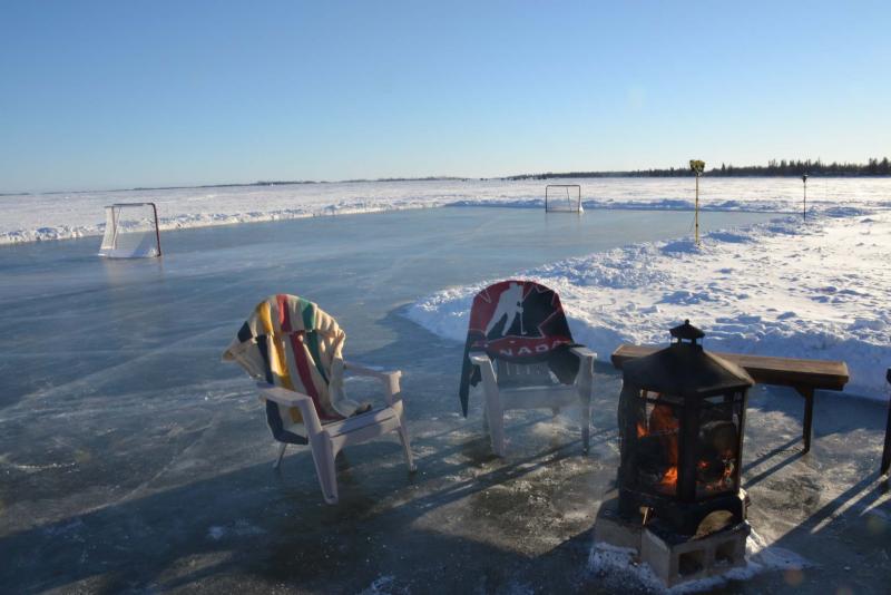 <p>After five years, Blair Sonnichsen put his idea into practice &mdash; building an 80 by 140 foot rink on Lake Winnipeg. He even has a fire pit nearby.</p></p>