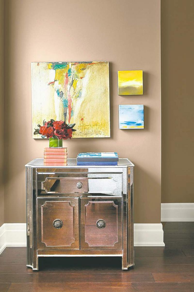 Smokey grey instantly updates a room: Benjamin Moore's Stardust is on the walls, while the trim is White Dove.