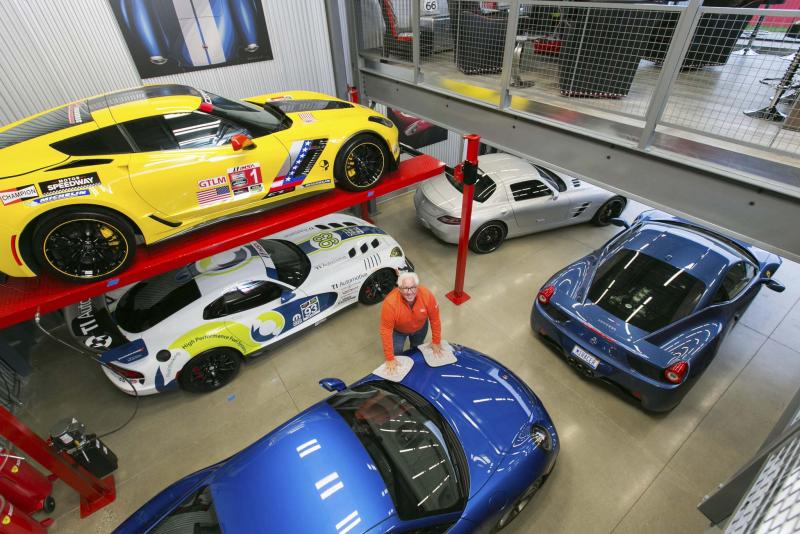 <p>John F. Martin / Washington Post</p><p>TI Automotive head Bill Kozyra wipes down his 2016 Porsche 911 GT3 in his private garage at the M1 Concourse in Pontiac, Mich. </p></p>