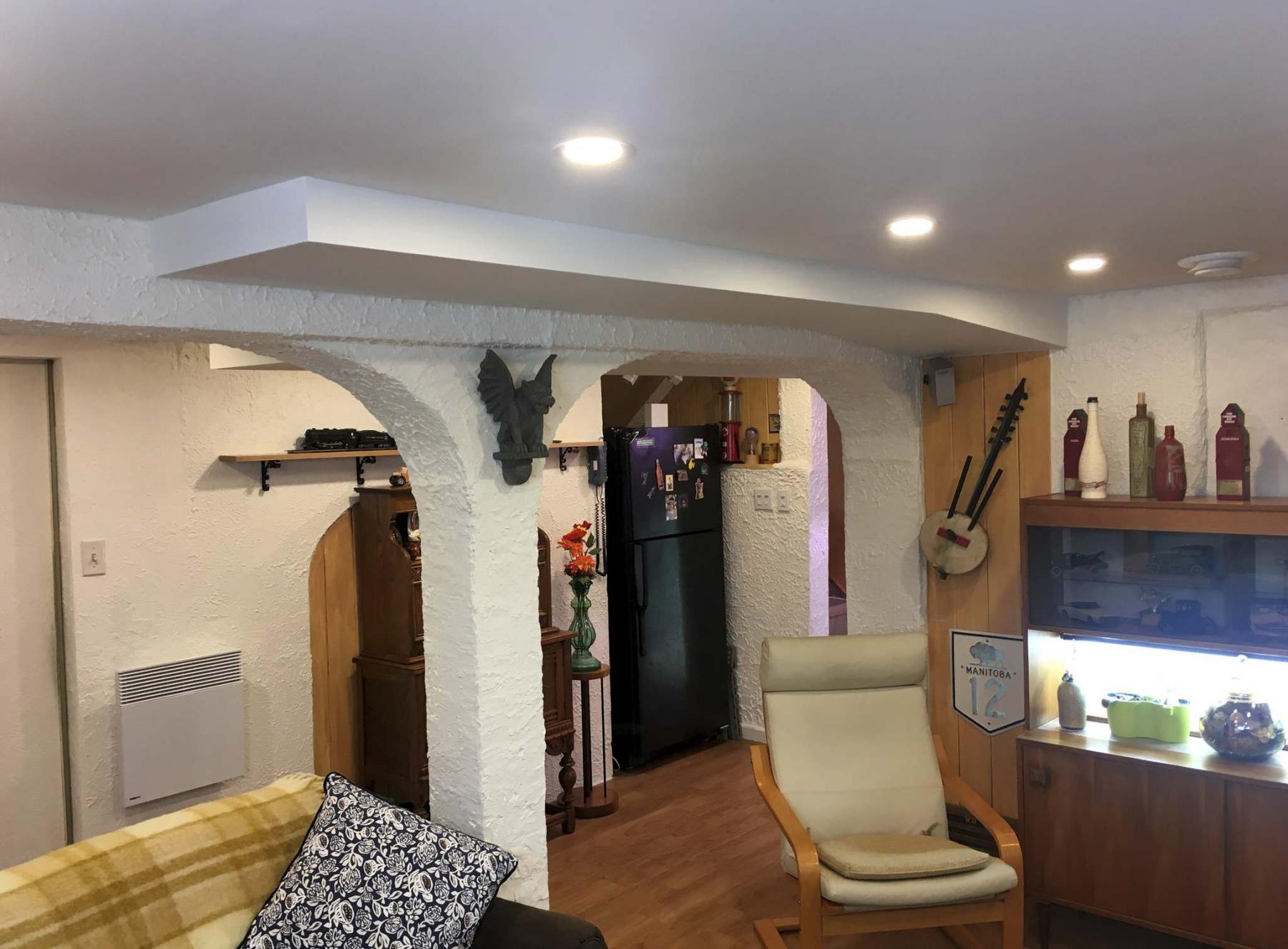 <p>Photos by Marc LaBossiere / Winnipeg Free Press</p><p>An optical illusion allows the boxing around the lower protruding ducts to look slimmer because the ceiling is slightly lower. </p>