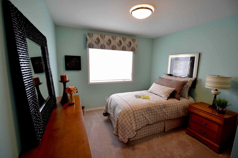 Both secondary bedrooms are big, bright and come with double closets.