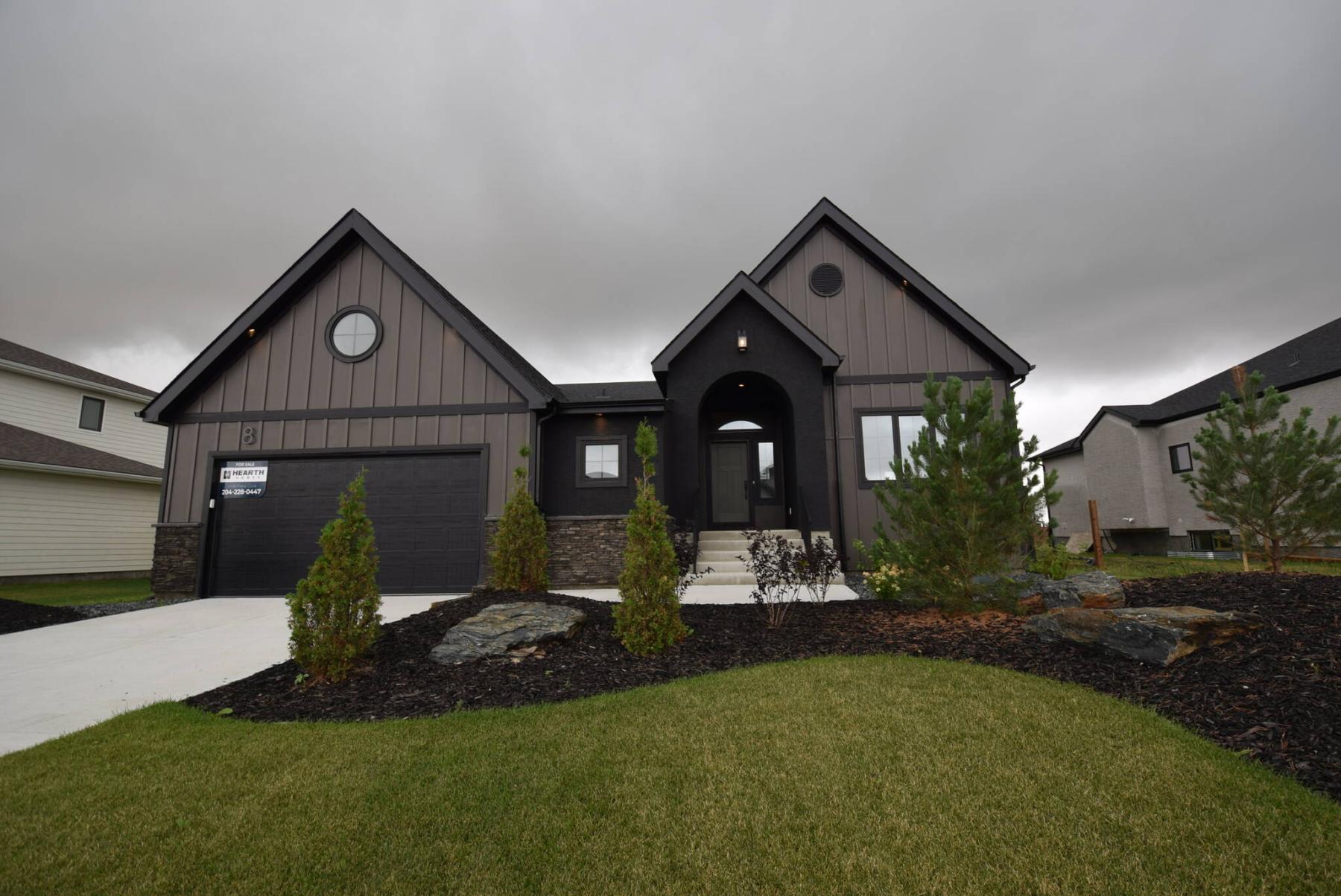  <p>Photos by Todd Lewys / Free Press</p>
                                <p>The Oliver II, an inviting 1,889 sq. ft. bungalow by Hearth Homes, offers a wonderful blend of country warmth and modern function.</p> 