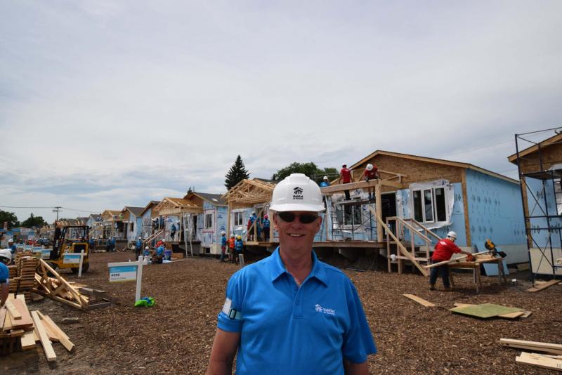 <p>Photos by Todd Lewys</p><p>Habitat for Humanity Manitoba CEO Sandy Hopkins stands in front of construction at the project at 210 Lyle Street in St. James.</p>