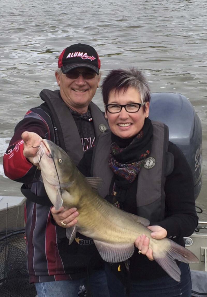 <p>Supplied</p><p>Hooked on Shelter Fishing Derby organizer Donna Kirsch, along with Clancy Solomon, proudly displays the catfish she caught at the 2015 tournament. This year's event, the 10th annual edition, gets underway Sept. 21 at Selkirk Park. Registration is $65.</p>