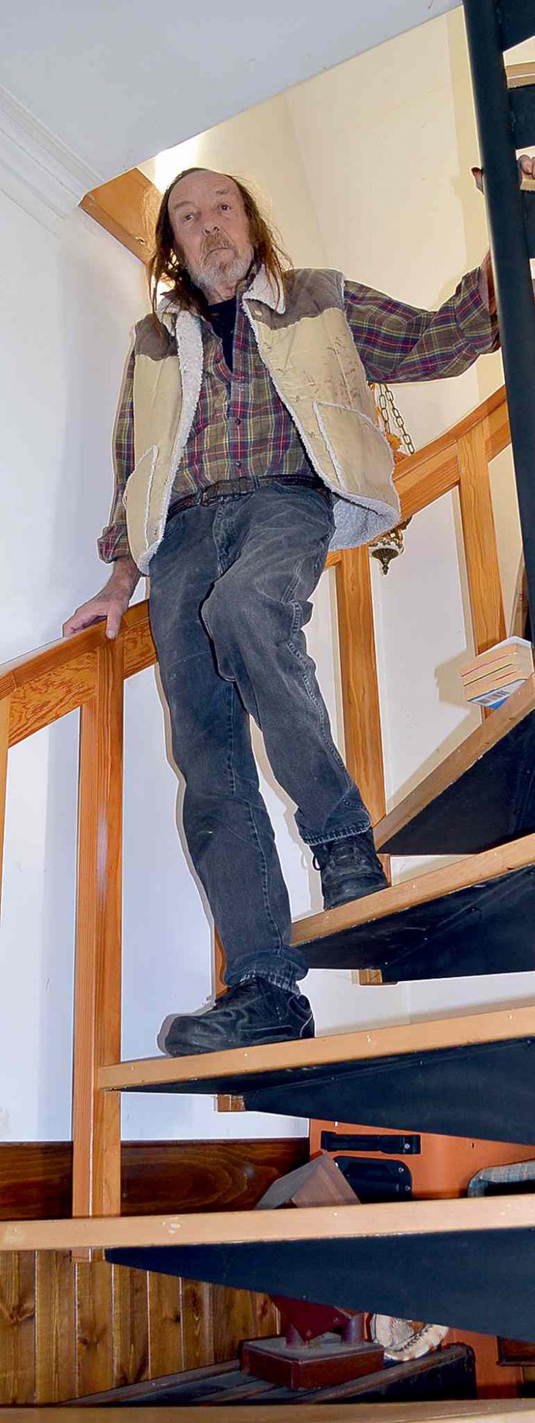 Watson created the spiral staircase from scrap steel and recycled wood.