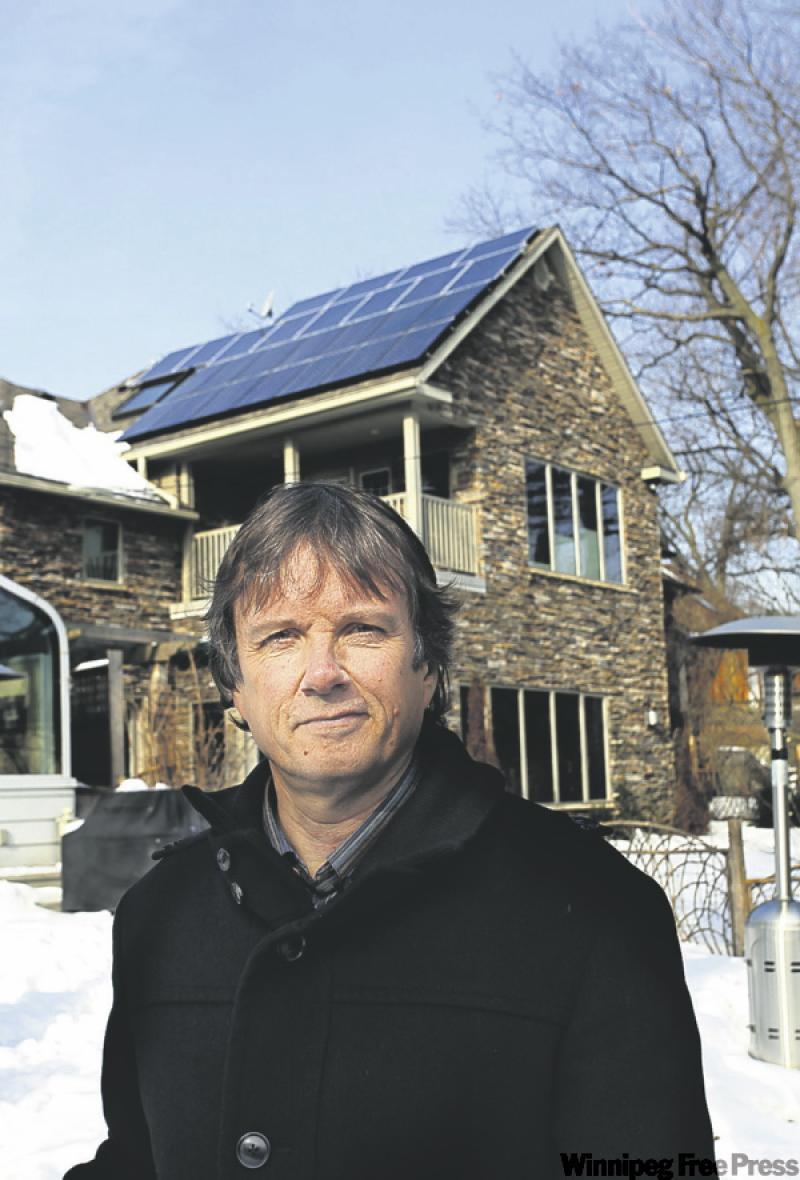 Mike Brigham gave his house  a complete green reno  -- and he is tickled pink.
