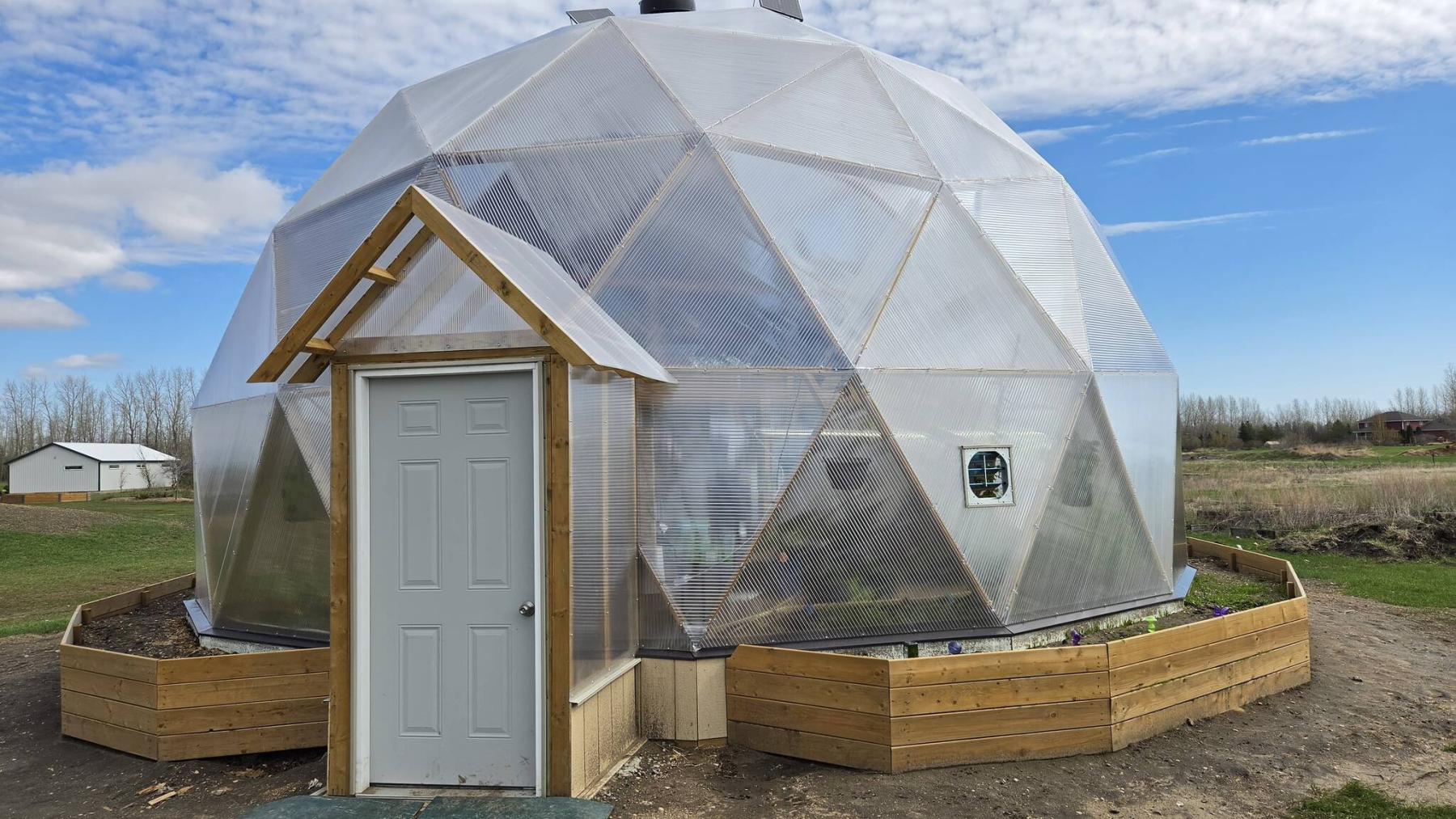  <p>NewRoots Construction and Landscaping photo</p>
                                <p>Grow plants year round in this four-season geodesic greenhouse. Raised beds on the outside provide additional growing space.</p> 