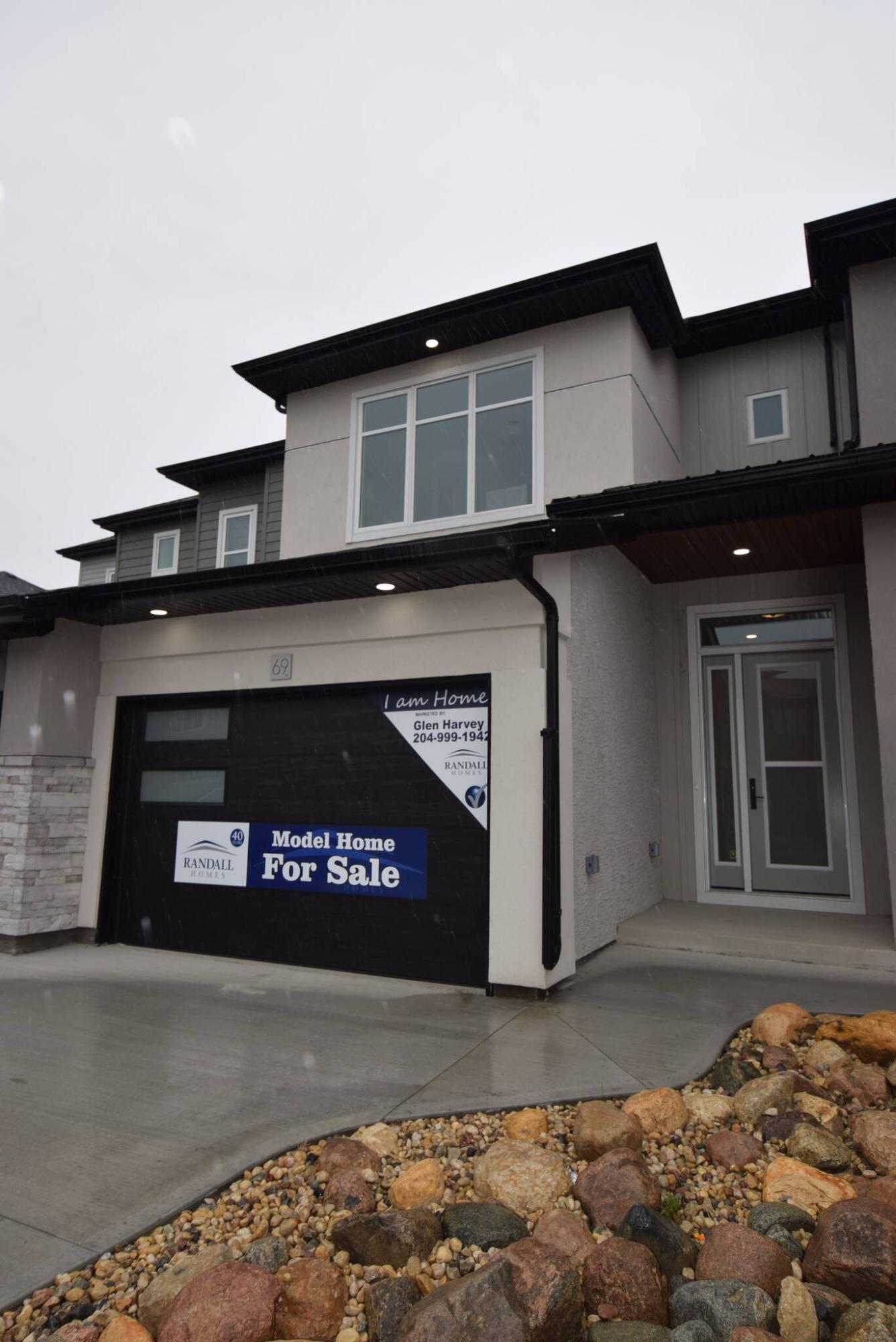  <p>Photos by Todd Lewys / Free Press</p>
                                <p>The attached townhomes come with three bedrooms, 2.5 baths and livable, style-packed floor plans.</p> 