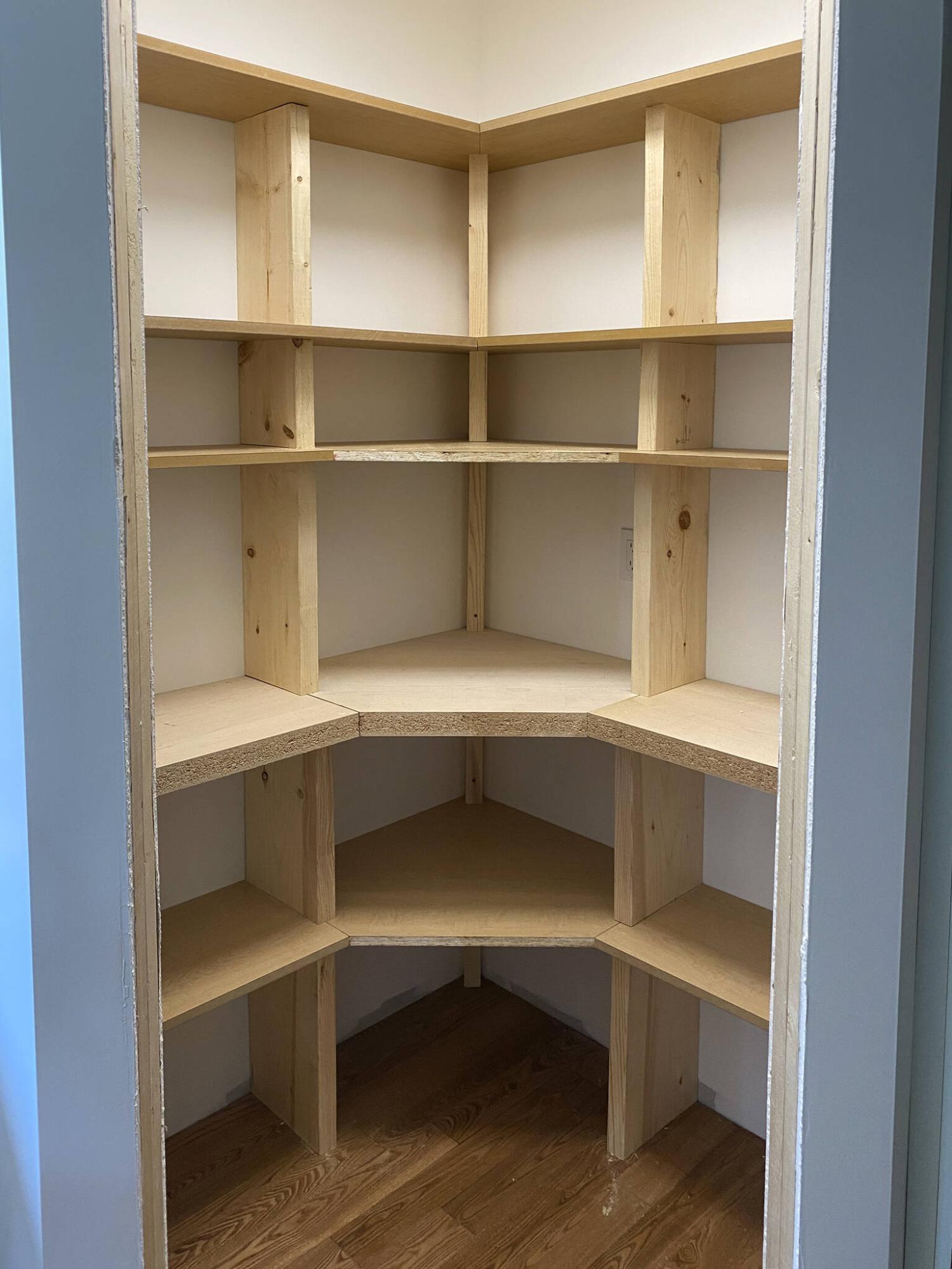  <p>Photos by Marc LaBossiere / Free Press</p>
                                <p>Veneer slabs were cut on site to create custom pantry shelving, along with a two-inch countertop.</p> 
