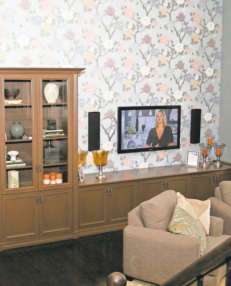 The thin profile and simple frame on flat screen TVs has revolutionized the way we can decorate the living room and den.