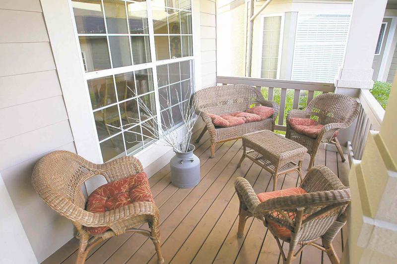 The freestanding condominium at 18-460 Lindenwood Drive even has a front porch.
