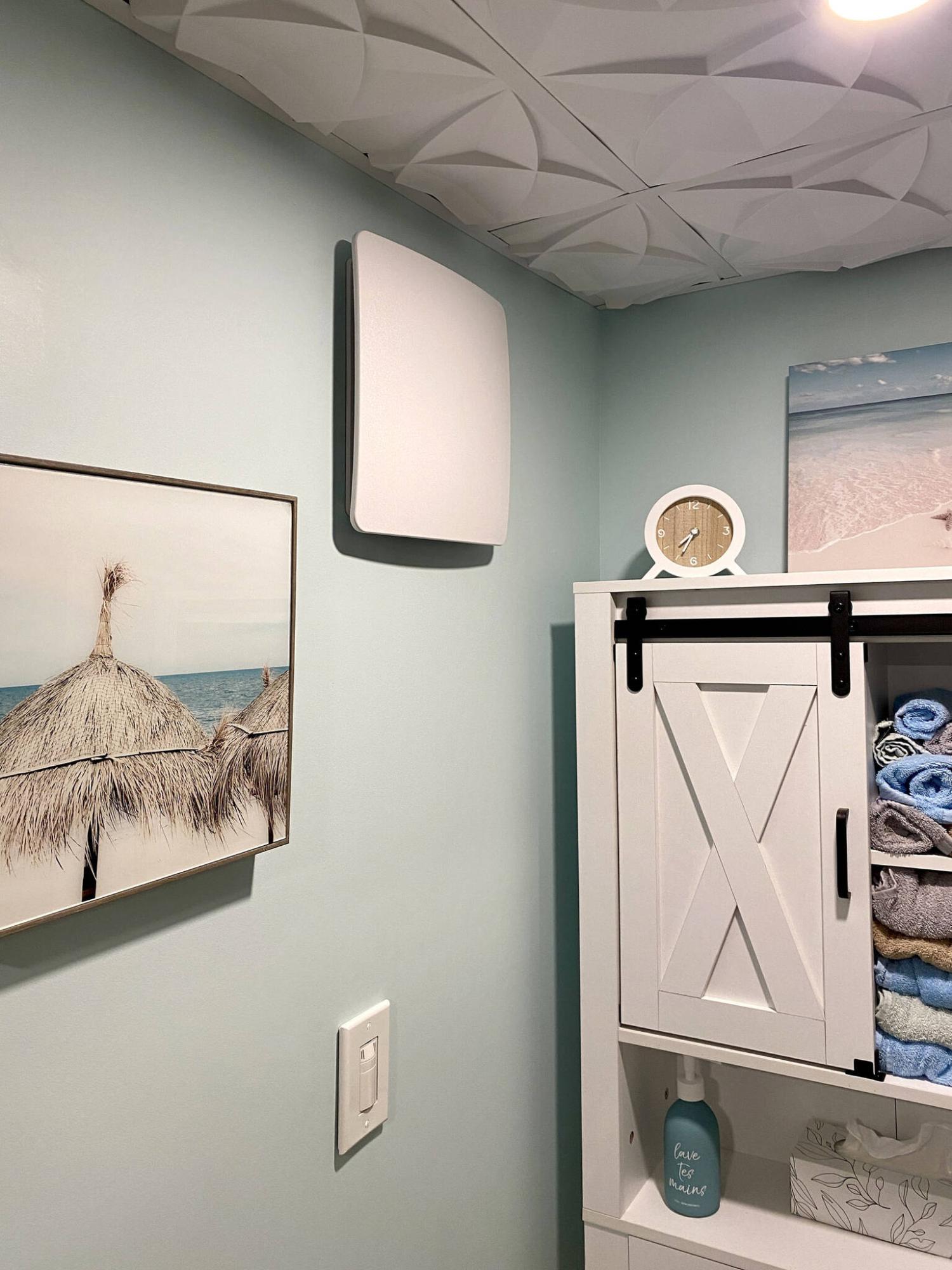  <p>photos by Marc LaBossiere / Free Press</p>
                                <p>In lieu of a ceiling application, the bathroom exhaust fan is mounted vertically along the top of the wall adjacent the utility room, to allow proper venting.</p> 
