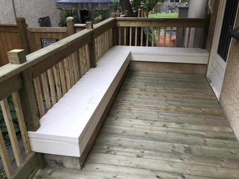 <p>Photos by Marc LaBossiere / Winnipeg Free Press</p><p>Rena's new porch. Note the top of the old stucco wall, which now serves as a bench top on the new porch, with the porch railing acting as the bench back.</p>