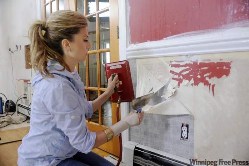 HGTV's Genevieve Gorder makes over a room on her series, "Dear Genevieve."