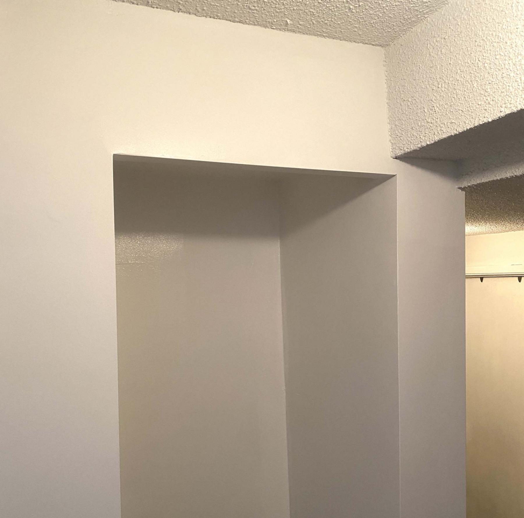 <p>A flat vertical surface was created on which the four cabinet doors could rest when closed.</p></p>