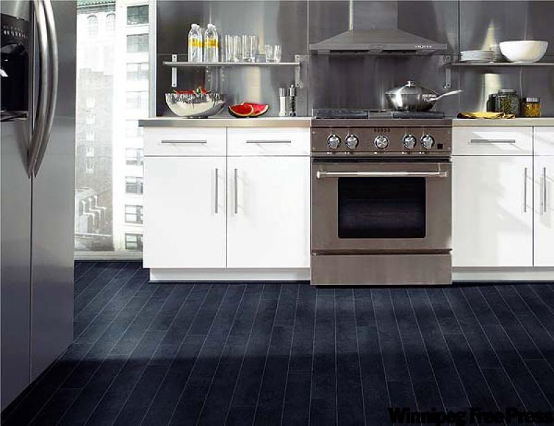 This office floor features Tarkett's Seagrass Thai from the Cross Country Collection.
