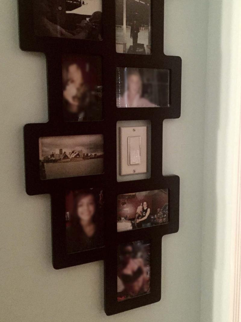 <p>With the glass removed, a light switch hides in one of the individual frames. </p></p>