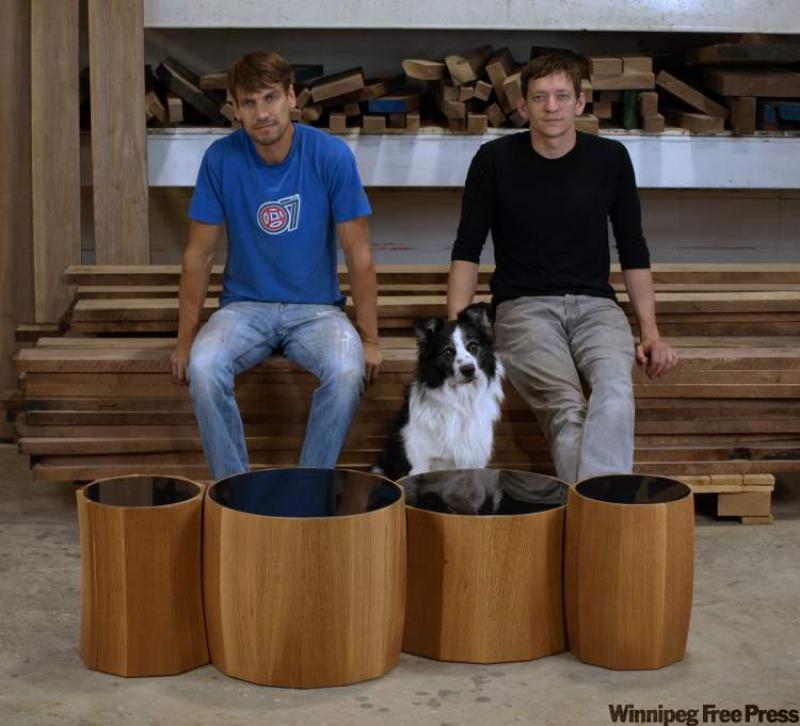 IZM founders Shane Pawluk, left, and Jerad Mack attended IDSwest in Vancouver for the first time, showcasing some of their high-end furniture, as well as debuting their new Flora side tables.