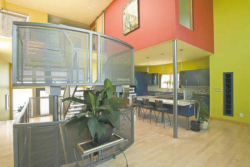 Thanks to huge windows every where -- including a skylight positioned perfectly over the staircase -- and a fusion of modern and traditional design elements, the interior is filled with natural light.