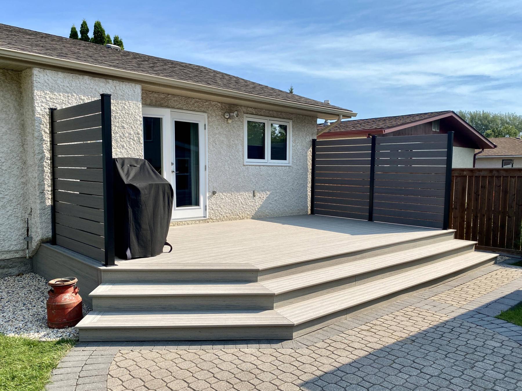  <p>Photos by Marc LaBossiere / Free Press</p>
                                <p>The initial composite decking could not be used as a privacy wall due to digital printing on every board, so an alternative manufacturer was chosen.</p> 