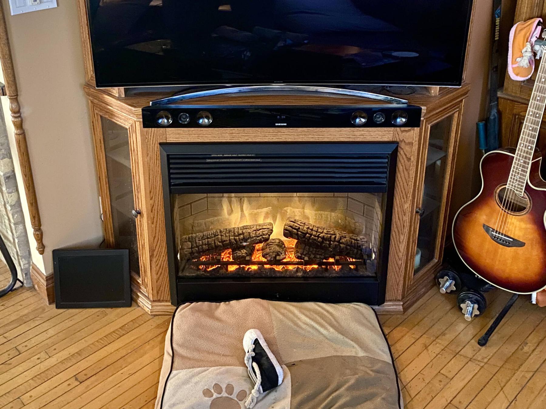  <p>Photos by Marc LaBossiere / Free Press</p>
                                <p>The bulky Dimplex log-box electric fireplace is still in use within the corner entertainment cabinet shelving unit in our living room.</p> 