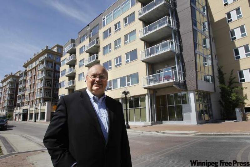 âThe area used to be little more than a gravel path,â says realtor Bill Thiessen, shown here by The Strand on Waterfront Drive. Thiessen has long been involved in the development of Winnipegâs downtown.