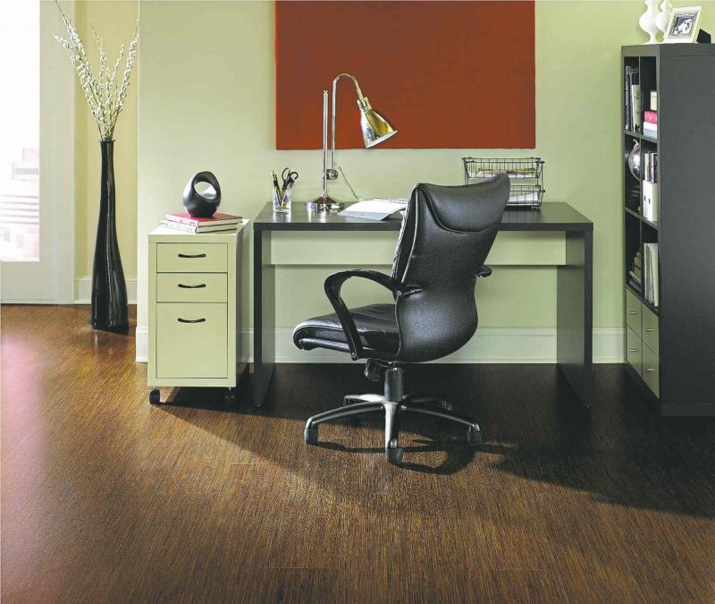 A small home office can be tucked into a nook under a stairwell or set up along a wide hallway.
