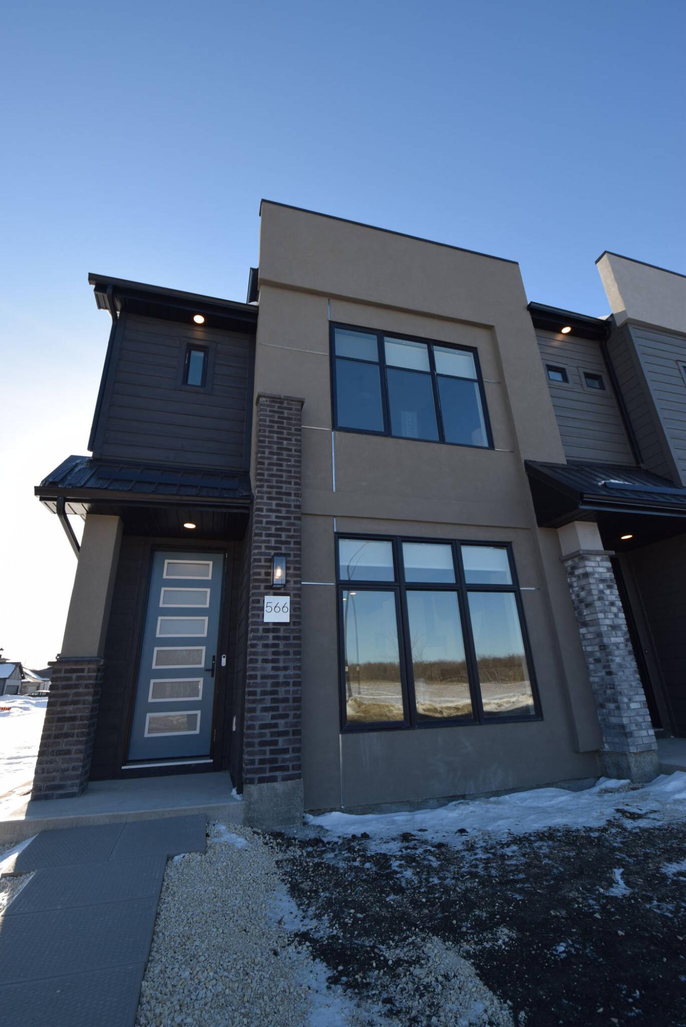  <p>TODD LEWYS / FREE PRESS</p>
                                <p>Available in three floor plans that range from 1,350 sq. ft. to 1,536 sq. ft., the townhomes feature a logical yet luxurious design that takes turnkey condo living to the next level.</p> 