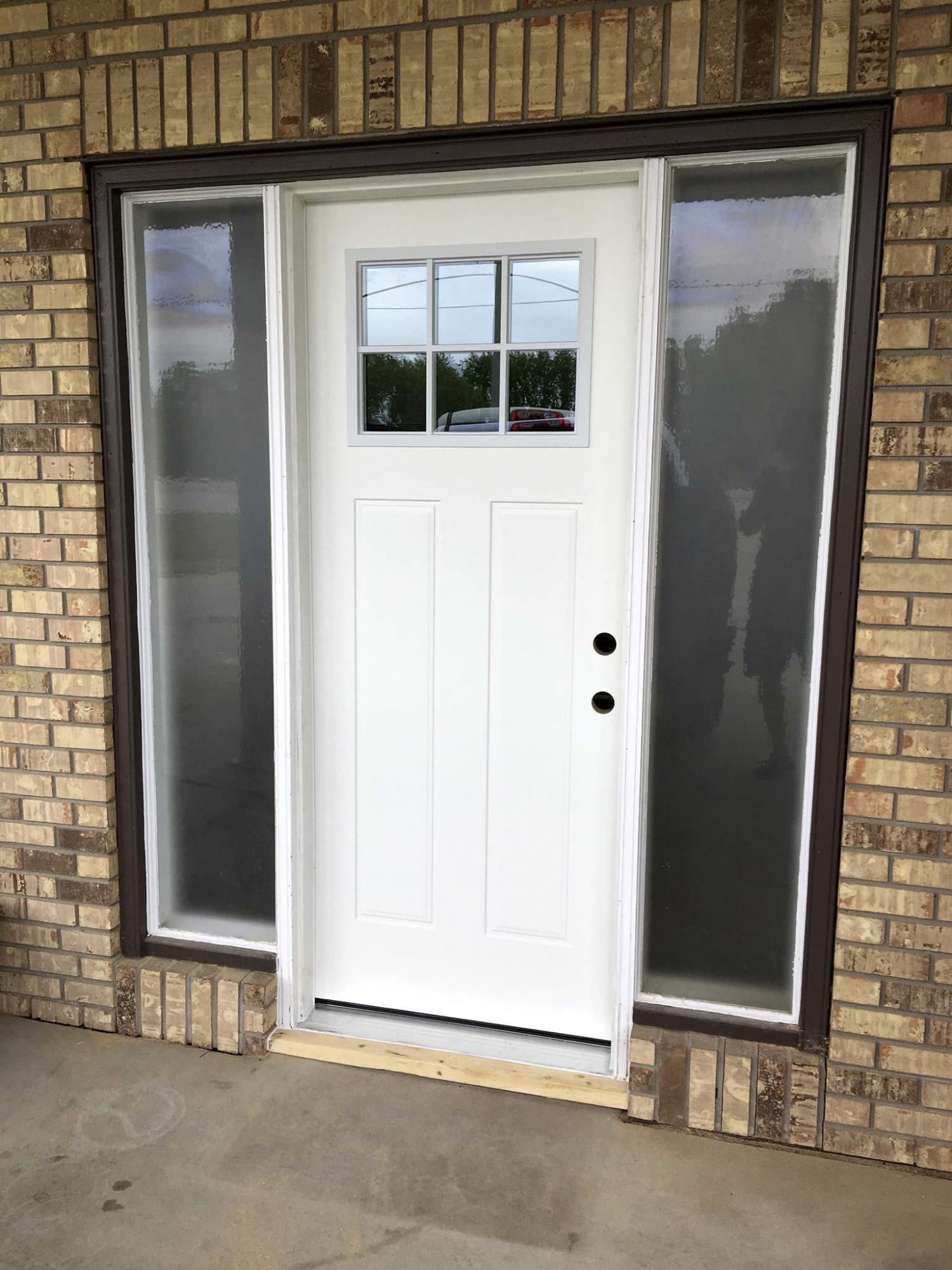 <p>Marc LaBossiere / Winnipeg Free Press</p><p>The new door was secured within a carefully prepped rough opening. </p>