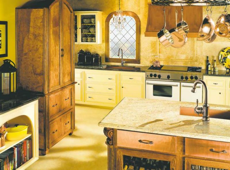While the feature photograph boasts a kitchen that is spacious and looks like it belongs in an inn in Tuscany, the decor style is achievable on a smaller scale.