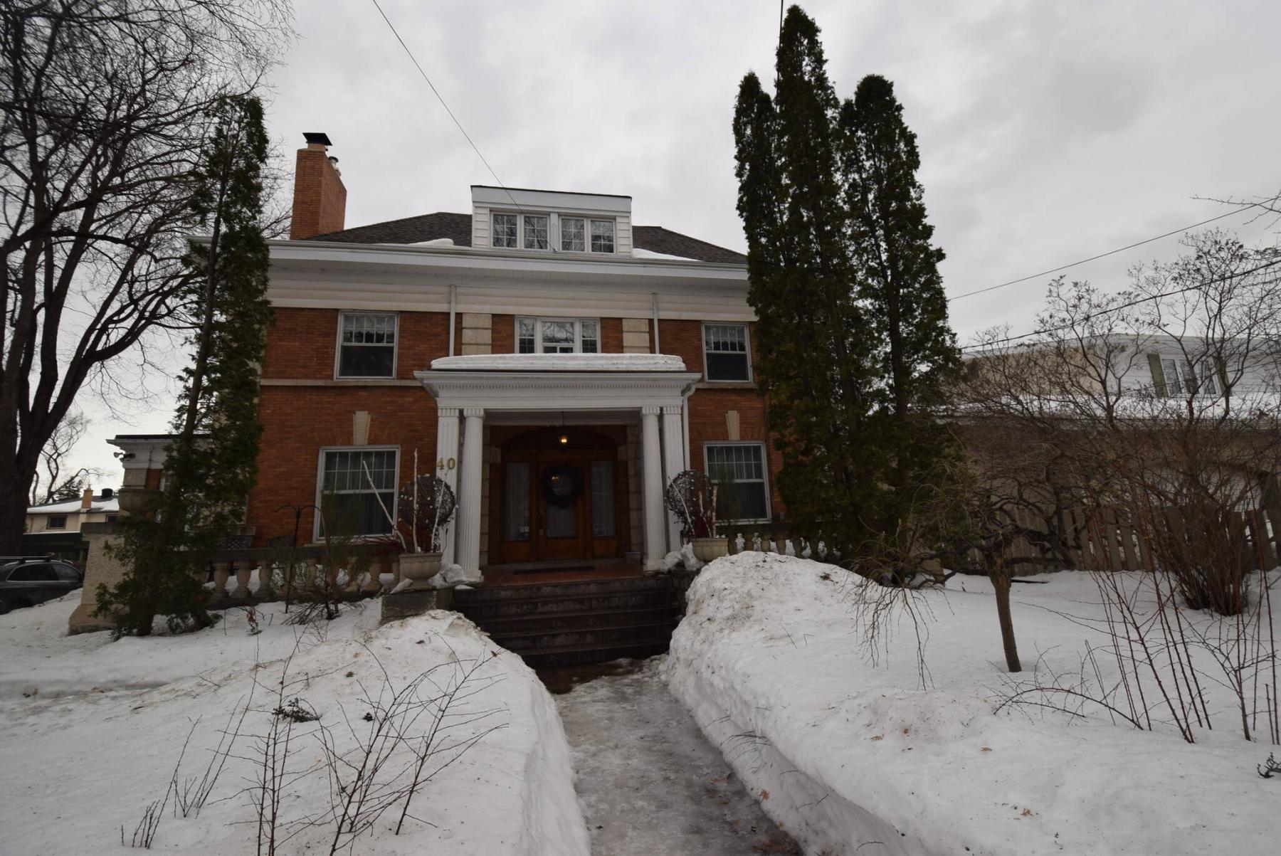 <p>Photos by Todd Lewys / Winnipeg Free Press</p><p> This massive home stands out with its magnificent red brick exterior, pillared front entrance and limestone accents on its corners.</p>