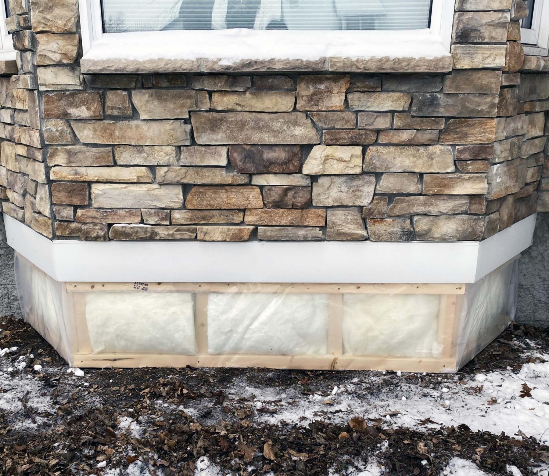 <p>Once the framing was completed and the cavity filled with insulation, the entire structure was sealed with thick poly. </p></p>
