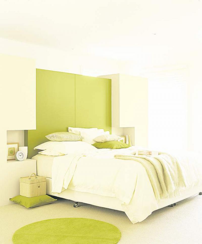 The strong colour you choose to paint at the head of the bed won't be in your line of sight when you're trying to sleep.