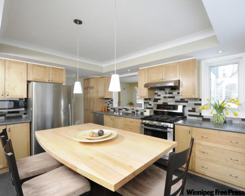 Save money by keeping the existing flooring and cabinetry in kitchen. 