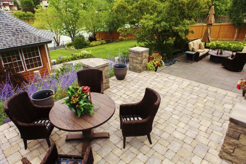 <p>B. Rocke Landscaping</p><p>This backyard which features two separate conversation areas is being completed in phases. The funtionality of the upper area will be enhanced with an outdoor kitchen sometime in the future.</p>