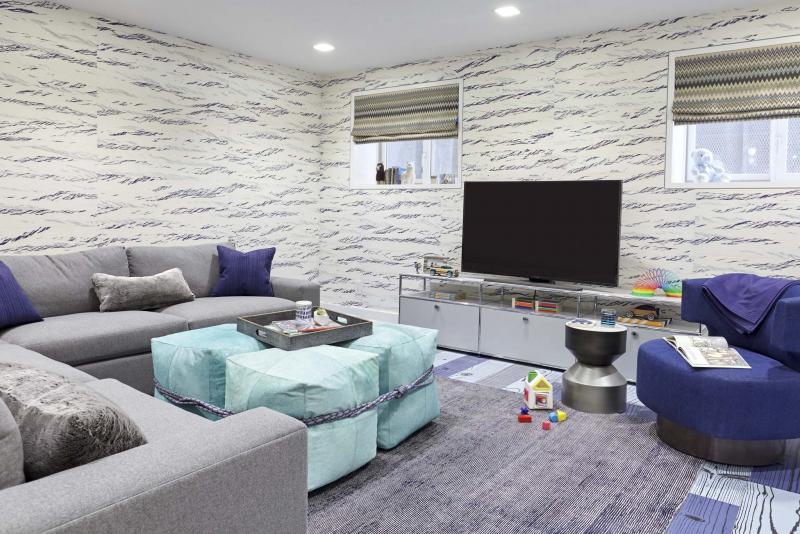 <p>RYAN DAUSCH / JENNY KIRSCHNER / THE ASSOCIATED PRESS</p><p>Cheerful colour and cosy furnishings with warm, soft upholstery transform a basement into an inviting and family friendly space.</p>