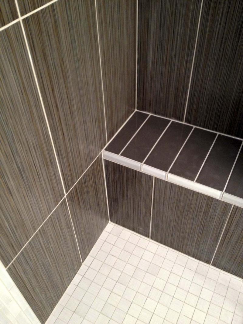 <p>Marc LaBossiere / Winnipeg Free Press</p><p>Custom shower stall tiling and bench design can be done on your own.</p>