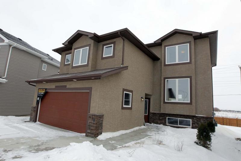 <p>BORIS MINKEVICH / WINNIPEG FREE PRESS</p><p>19 Castlebury Meadows Dr. in Castlebury Meadows is one of the more than 120 homes featured in the Spring Parade of Homes.</p>
