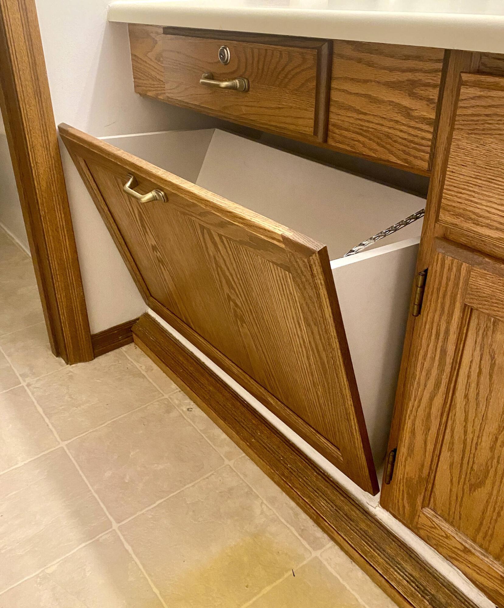  <p>The custom box has triangular sides that meet the slant of the staircase ceiling, mounted on a piano hinge along the bottom.</p> 