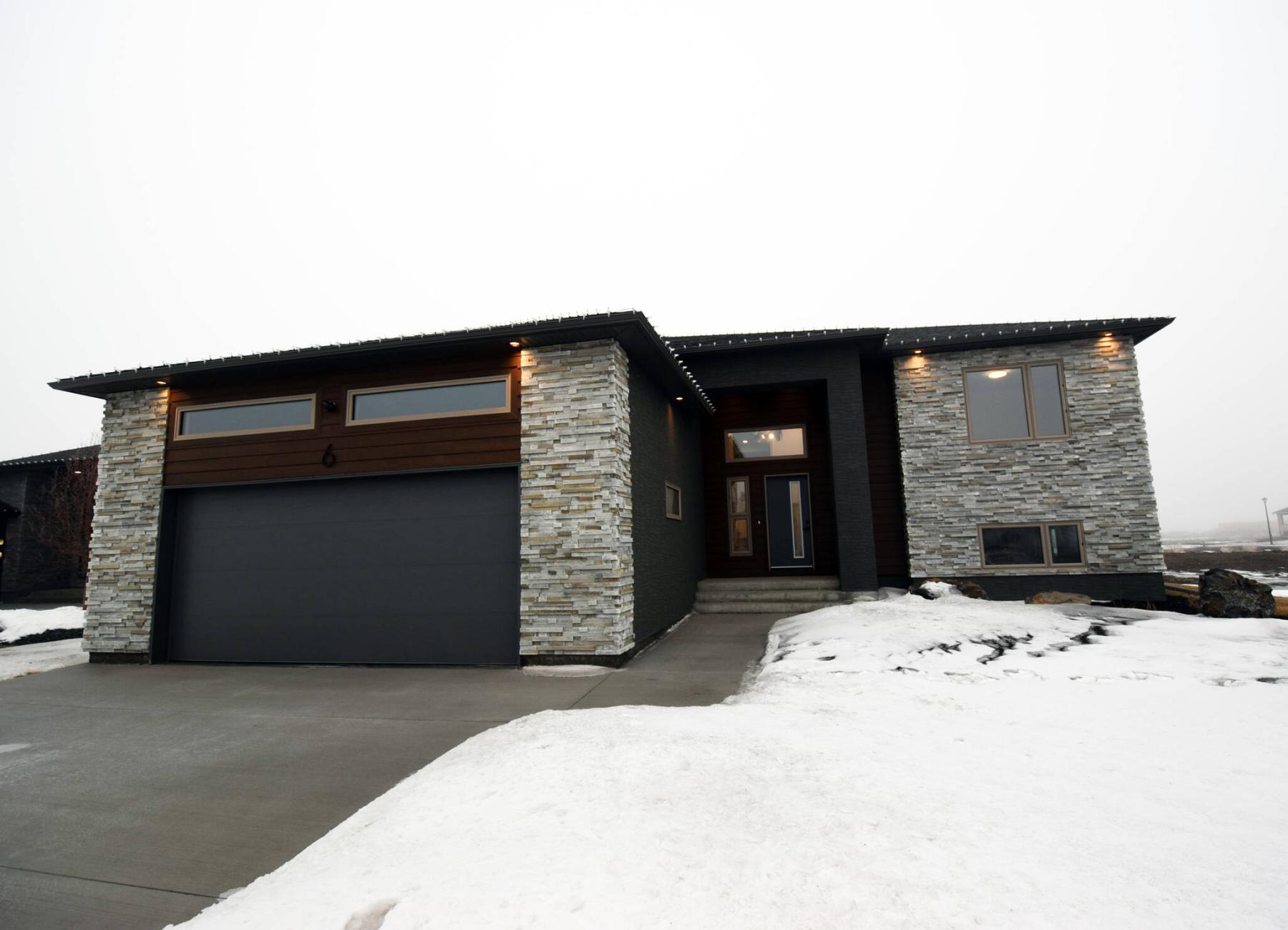  <p>Photos by Todd Lewys / Winnipeg Free Press</p>
                                <p>This large raised bungalow features a well-balanced design.</p> 