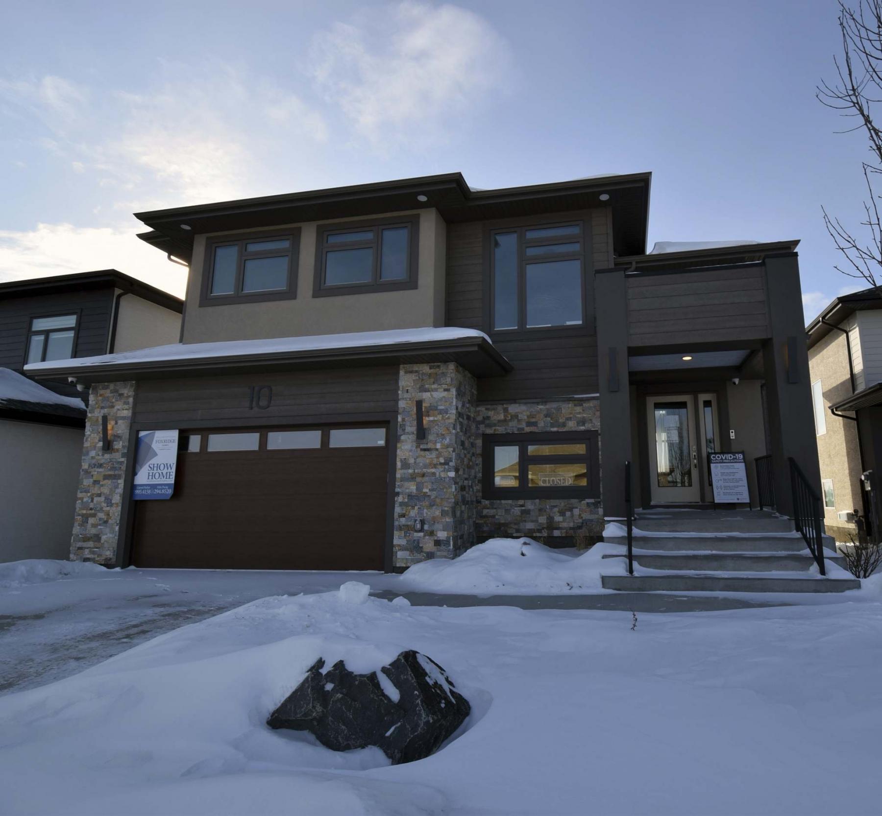 <p>A warm, richly-finished exterior provides a preview of what awaits inside the well-designed two-storey masterpiece.</p></p>