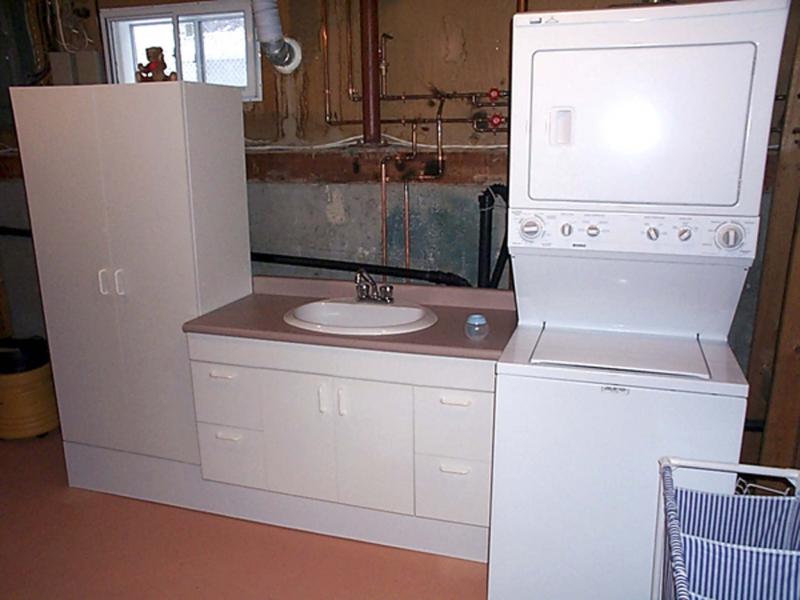 <p>Marc LaBossiere / Winnipeg Free Press Files</p><p>In Marc&rsquo;s first home renovation, a storage wardrobe and sink vanity rest on a custom base, adjacent to a new stackable washer and dryer unit. </p>