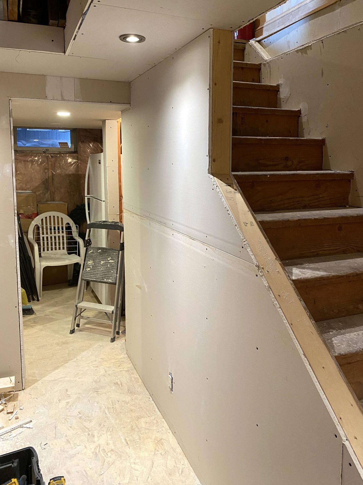  <p>Photos by Marc LaBossiere / Free Press</p>
                                <p>The staircase presented a challenge for negotiating full sheets of drywall downstairs.</p> 