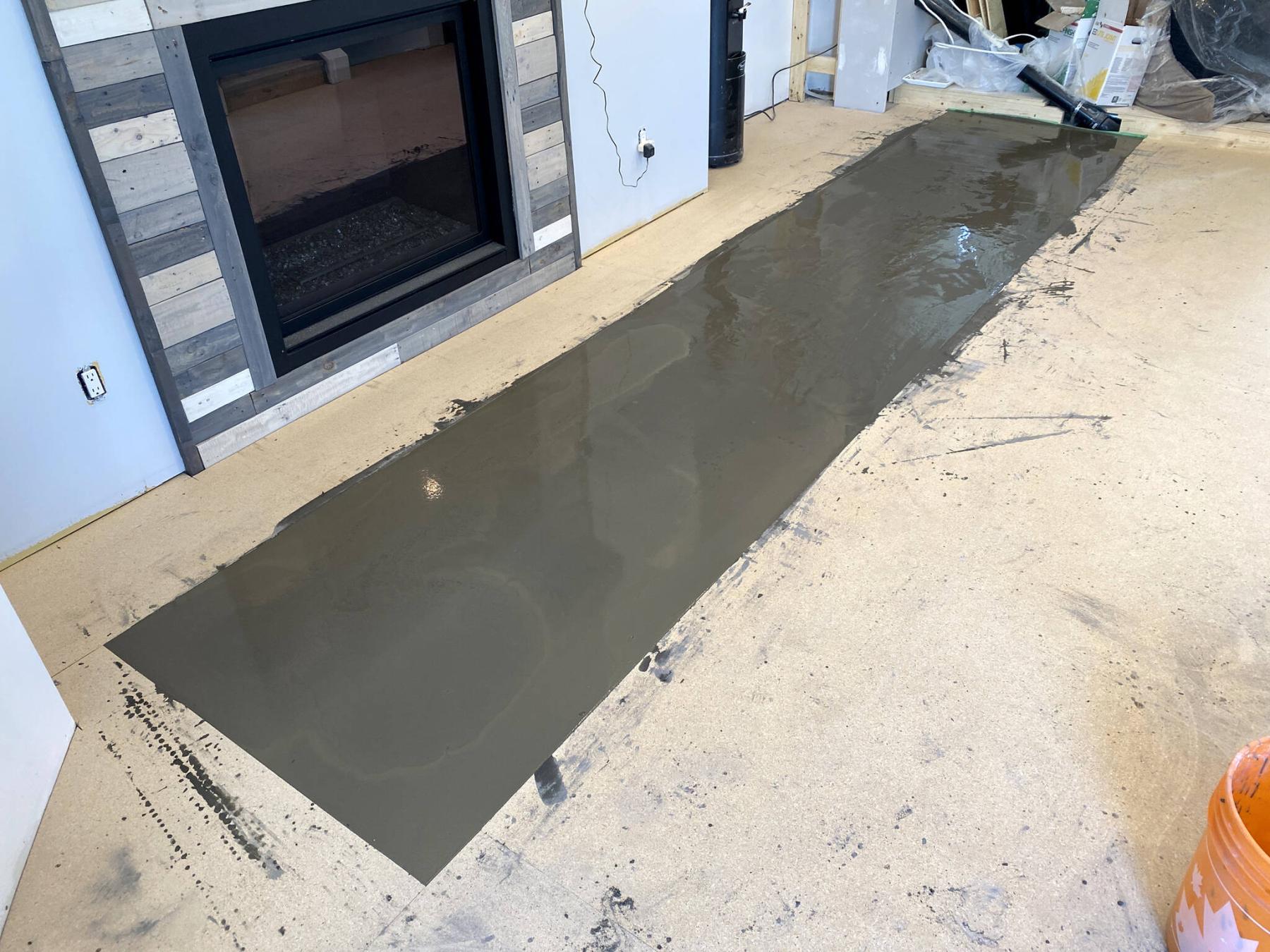  <p>Photos by Marc LaBossiere / Winnipeg Free Press</p>
                                <p>Self-levelling compound is used to eliminate a hump along one seam of the adjacent plywood subfloor.</p> 